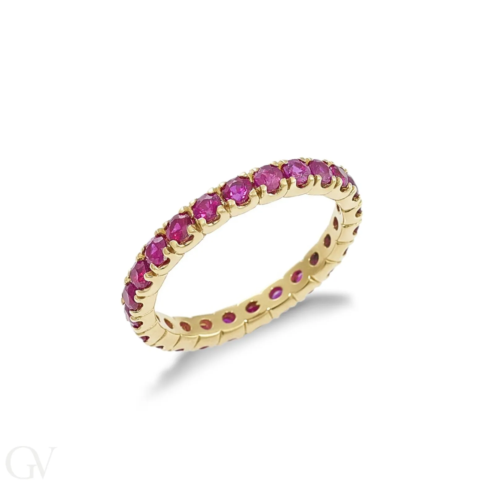 Eternity modello a griffe in Oro Giallo 18k con Rubini